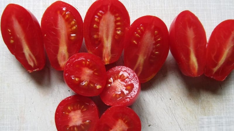 Una rica cosecha de pequeños tomates con forma de ciruela de cada arbusto: tomate rosa pasa y los secretos para cuidarlo