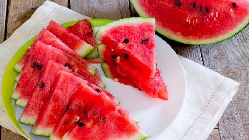 What is the calorie content of watermelon, and how is it beneficial for the human body?