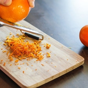 What are the benefits of orange zest for the human body?