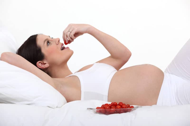 Is it possible to eat cherries during pregnancy and how are they beneficial for the expectant mother and baby?